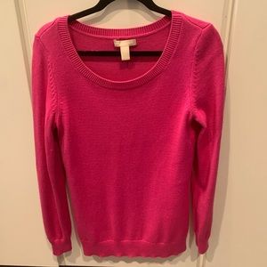 Pink sweater with gold sequin elbow pads